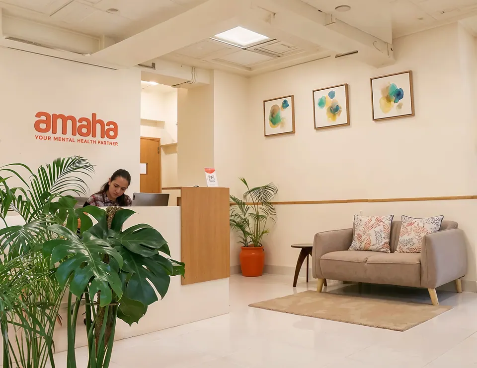 Amaha’s branded reception with a staff member at the desk